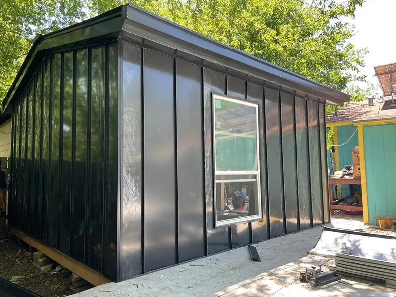 Black standing seam metal wall panels for Metal Roof Installation in Waikoloa Village
