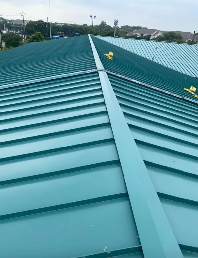 Green commercial metal roof ridge and valley for Metal Roof Repair in Waikoloa Village